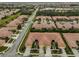 Aerial view of community, showing neighborhood layout and homes at 314 Bluewater Falls Ct, Apollo Beach, FL 33572