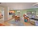 Light-filled dining room adjacent to the kitchen and living areas at 314 Bluewater Falls Ct, Apollo Beach, FL 33572