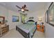 Spacious main bedroom with a king-size bed and en-suite bathroom at 314 Bluewater Falls Ct, Apollo Beach, FL 33572