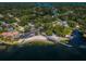 Wide aerial view of the neighborhood and lake at 3201 Belmore Rd, Tampa, FL 33618