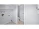 Small bathroom with toilet and laundry hookups at 3201 Belmore Rd, Tampa, FL 33618