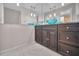 Modern bathroom with dark vanity and vessel sink at 3201 Belmore Rd, Tampa, FL 33618