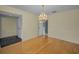 Bright dining room with hardwood floors and chandelier at 3201 Belmore Rd, Tampa, FL 33618