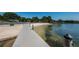 Community boardwalk stretching to a lakefront dock at 3201 Belmore Rd, Tampa, FL 33618