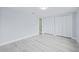 Spacious bedroom with double closets and light flooring at 3334 Rock Valley Dr, Holiday, FL 34691