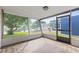 Relaxing screened porch overlooking a peaceful canal at 3334 Rock Valley Dr, Holiday, FL 34691