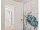 Bathroom with shower and turtle-themed decor at 3406 Waterbridge Dr, Tampa, FL 33618