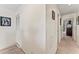 Upper hallway with access to bedrooms and linen closet at 3406 Waterbridge Dr, Tampa, FL 33618