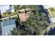 Aerial view of house and neighborhood at 354 Ixora Dr, Palm Harbor, FL 34684