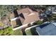 Aerial view showcasing house and backyard with a fenced perimeter at 354 Ixora Dr, Palm Harbor, FL 34684