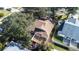 Aerial view showcasing house, backyard, and surrounding neighborhood at 354 Ixora Dr, Palm Harbor, FL 34684