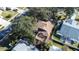 Aerial view showcasing house, backyard, and surrounding neighborhood at 354 Ixora Dr, Palm Harbor, FL 34684