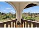 Private balcony view overlooking the lush greenery, perfect for enjoying nature and relaxing outdoors at 360 N Bayshore Blvd # 207, Clearwater, FL 33759