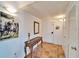 Welcoming hallway with decorative table, terracotta tile flooring, and neutral paint at 360 N Bayshore Blvd # 207, Clearwater, FL 33759