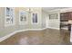 Breakfast nook with tile floor and built-in shelving at 3717 Quail Nesting Pl, Plant City, FL 33565