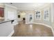 Dining room with tile floor and view into living room at 3717 Quail Nesting Pl, Plant City, FL 33565