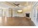 Spacious living room featuring a fireplace and tile flooring at 3717 Quail Nesting Pl, Plant City, FL 33565