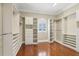 Large walk-in closet with ample shelving and hanging space at 3717 Quail Nesting Pl, Plant City, FL 33565