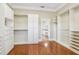 Bright walk-in closet offering extensive storage options at 3717 Quail Nesting Pl, Plant City, FL 33565