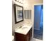 Bathroom boasts vanity, mirror and access to another room at 3863 Island Way, St Petersburg, FL 33705