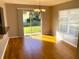 Bright dining area with hardwood floors and sliding glass doors at 3863 Island Way, St Petersburg, FL 33705