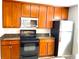 Kitchen with granite countertops and stainless steel appliances at 3863 Island Way, St Petersburg, FL 33705