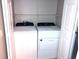 Laundry closet with Whirlpool washer and dryer at 3863 Island Way, St Petersburg, FL 33705