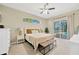 Main bedroom with sliding door access to the pool area at 4325 Swift Cir, Valrico, FL 33596