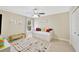 Charming bedroom with daybed, large rug, and cheerful decor at 4325 Swift Cir, Valrico, FL 33596