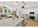 Modern kitchen with gray cabinets, white countertops, and stainless steel appliances at 4325 Swift Cir, Valrico, FL 33596