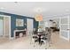 Charming dining room with dark wood table and metal chairs at 4811 Culbreath Isles Rd, Tampa, FL 33629