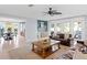 Spacious living room with leather sofas and a wooden coffee table at 4811 Culbreath Isles Rd, Tampa, FL 33629