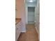 Bathroom with vanity, tile floors, toilet, and walk in closet at 501 Knights Run Ave # 1113, Tampa, FL 33602