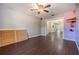 Bright living room featuring hardwood floors and an open floor plan at 5043 Mockingbird Dr, Dade City, FL 33523