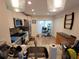 Modern kitchen with stainless steel appliances and granite counter at 562 Andorra Ne Cir # 562, St Petersburg, FL 33703