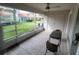 Relaxing screened porch with backyard view and ceiling fan at 562 Andorra Ne Cir # 562, St Petersburg, FL 33703