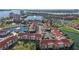 Aerial view of a waterfront community with lush landscaping and multiple buildings at 6085 Bahia Del Mar Blvd # 105, St Petersburg, FL 33715