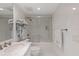 Clean bathroom with bathtub, shower, and marble vanity at 6085 Bahia Del Mar Blvd # 105, St Petersburg, FL 33715