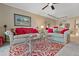 Living room with two sofas, coffee table, and a view into the dining area at 6085 Bahia Del Mar Blvd # 105, St Petersburg, FL 33715