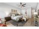 Bright bedroom with a king-size bed and en-suite bathroom at 6210 Nikki Ln, Odessa, FL 33556