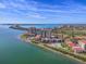 Aerial view of waterfront condos with pool and bridge views at 6322 Palma Del Mar S Blvd # 1001, St Petersburg, FL 33715