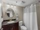 Bathroom with granite vanity and shower/tub combo at 6322 Palma Del Mar S Blvd # 1001, St Petersburg, FL 33715