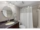 Bathroom with granite vanity and shower/tub combo at 6322 Palma Del Mar S Blvd # 1001, St Petersburg, FL 33715