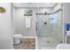 Clean bathroom with a walk-in shower and updated toilet at 6327 Emerson S Ave, St Petersburg, FL 33707