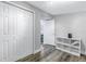 White closet doors with built-in shelving in a spacious bedroom at 6327 Emerson S Ave, St Petersburg, FL 33707