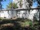 Rear view of house showing simple exterior at 6720 Hibiscus S Ave, South Pasadena, FL 33707