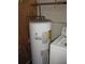 Mechanical room with water heater and plumbing at 6720 Hibiscus S Ave, South Pasadena, FL 33707