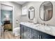 Modern bathroom with double vanity and marble countertop at 717 Carolina Ave, Tarpon Springs, FL 34689