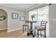 Bright breakfast nook with table and chairs, adjacent to kitchen at 717 Carolina Ave, Tarpon Springs, FL 34689