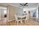 Farmhouse style dining area with wood-look floors at 717 Carolina Ave, Tarpon Springs, FL 34689